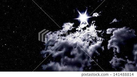 Glowing star in clouds on the night sky. Symbol of Christmas and New Year. Glowing star in clouds on the night sky. Symbol of Christmas and New Year. 141488814