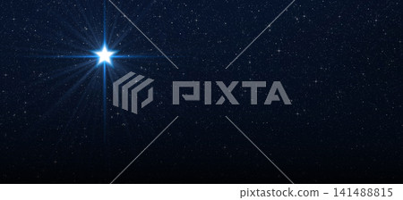 Five-pointed star with four bright rays in the starry sky. Five-pointed star with four bright rays in the starry sky. 141488815