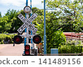 Amusement park railroad crossing sign 141489156