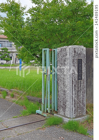 The gate of Satomi Elementary School: A stone main gate and lush green scenery standing at the site of a former school in Ichihara City, Chiba Prefecture. The gate of Satomi Elementary School: A stone main gate and lush green scenery standing at the site of a former school in Ichihara City, Chiba Prefecture. 141489195