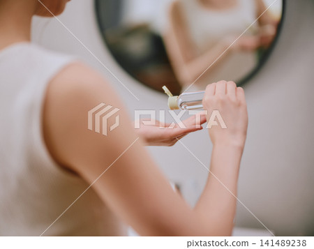 A young woman doing skin care A young woman doing skin care 141489238