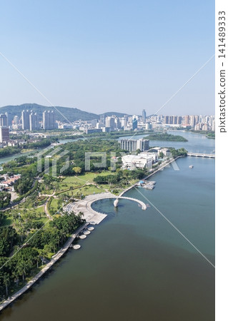 Aerial view of Xiamen Waterfront Avenue and the strait. Aerial view of Xiamen Waterfront Avenue and the strait. 141489333