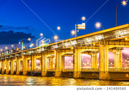 Summer in Seoul: The Moonlight Rainbow Fountain at Banpo Bridge and Namsan Tower Summer in Seoul: The Moonlight Rainbow Fountain at Banpo Bridge and Namsan Tower 141489560