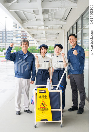 Four men and women who are staff members for building cleaning and facility maintenance. Four men and women who are staff members for building cleaning and facility maintenance. 141490303