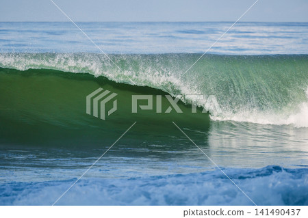 Crashing barrel wave in ocean. Best wave for surfing Crashing barrel wave in ocean. Best wave for surfing 141490437