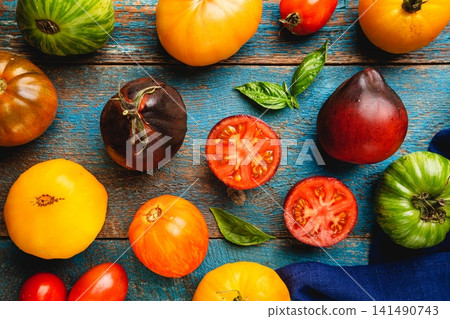 Mixed tomatoes top view. Mixed tomatoes top view. 141490743