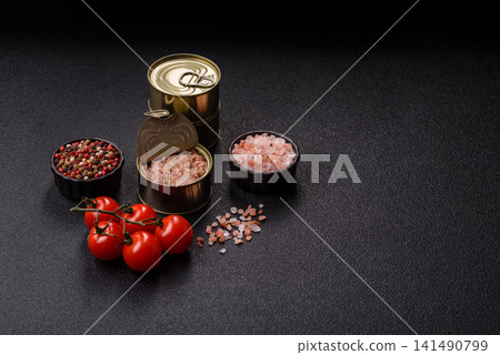 Fish, canned tuna chunks in brine for sandwiches and salads. Canned tuna Fish, canned tuna chunks in brine for sandwiches and salads. Canned tuna 141490799
