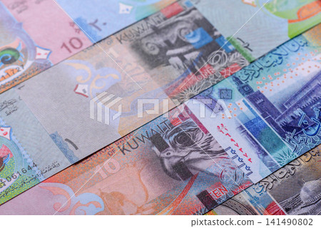 Kuwait paper money, dinar banknotes as currency for exchange or travel. Kuwaiti money Kuwait paper money, dinar banknotes as currency for exchange or travel. Kuwaiti money 141490802