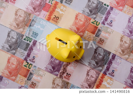 A piggy bank as a concept for storing, accumulating, and saving financial resources. A piggy bank 141490816