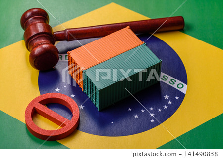 The cargo container ban on the brazil flag as a conceptual backdrop. Cargo container embargo 141490838