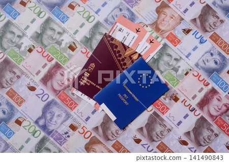 Sweden, swedish passport or id document with tickets for flight, travel. Swedish passport Sweden, swedish passport or id document with tickets for flight, travel. Swedish passport 141490843