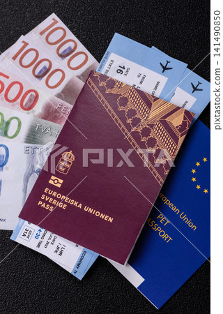 Sweden, swedish passport or id document with tickets for flight, travel. Swedish passport Sweden, swedish passport or id document with tickets for flight, travel. Swedish passport 141490850