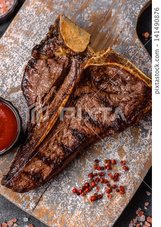 T-bone steak, beef meat grilled until done rare with salt and spices. T-bone steak T-bone steak, beef meat grilled until done rare with salt and spices. T-bone steak 141490876