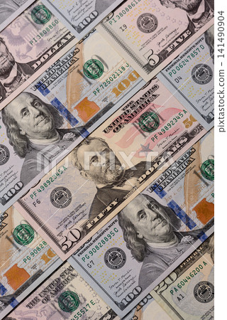 Paper US dollar bills of various denominations and cent coins as a business tool. Cash US dollars Paper US dollar bills of various denominations and cent coins as a business tool. Cash US dollars 141490904