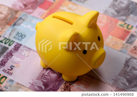A piggy bank as a concept for storing, accumulating, and saving financial resources. A piggy bank 141490908