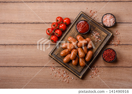 Chicken or pork grilling sausages with garlic, salt, and spices. Grilling sausages Chicken or pork grilling sausages with garlic, salt, and spices. Grilling sausages 141490916