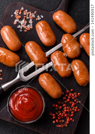 Chicken or pork grilling sausages with garlic, salt, and spices. Grilling sausages 141490917