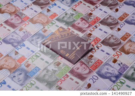 Sweden, swedish passport or id document with tickets for flight, travel. Swedish passport Sweden, swedish passport or id document with tickets for flight, travel. Swedish passport 141490927
