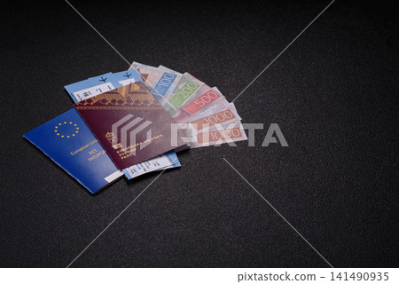 Sweden, swedish passport or id document with tickets for flight, travel. Swedish passport 141490935