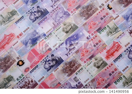 Taiwan, Taiwanese paper banknotes and coins, dollars of various denominations. Taiwanese dollars Taiwan, Taiwanese paper banknotes and coins, dollars of various denominations. Taiwanese dollars 141490956