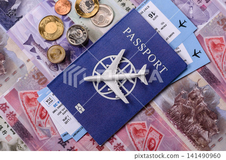 Taiwan, Taiwanese passport or id document with tickets for flight, travel. Taiwanese passport Taiwan, Taiwanese passport or id document with tickets for flight, travel. Taiwanese passport 141490960