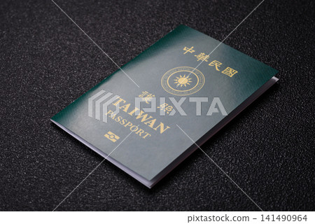 Taiwan, Taiwanese passport or id document with tickets for flight, travel. Taiwanese passport Taiwan, Taiwanese passport or id document with tickets for flight, travel. Taiwanese passport 141490964