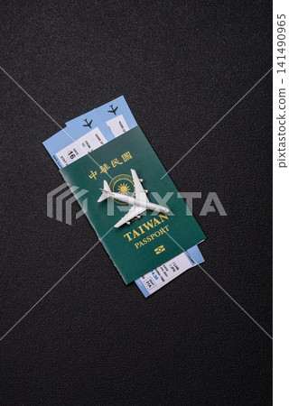 Taiwan, Taiwanese passport or id document with tickets for flight, travel. Taiwanese passport Taiwan, Taiwanese passport or id document with tickets for flight, travel. Taiwanese passport 141490965