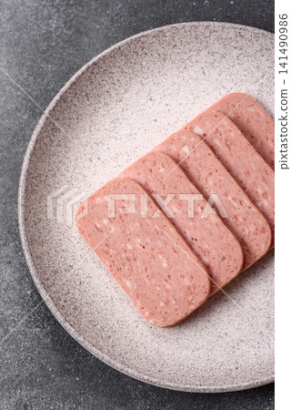 Canned spiced ham slices for holiday sandwiches. Ham slices Canned spiced ham slices for holiday sandwiches. Ham slices 141490986