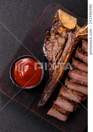 T-bone steak, beef meat grilled until done rare with salt and spices. T-bone steak T-bone steak, beef meat grilled until done rare with salt and spices. T-bone steak 141490990