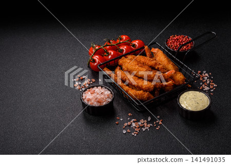 Shrimp or prawn tempura breaded with salt, spices and tartar sauce, Asian cuisine. Tempura shrimp Shrimp or prawn tempura breaded with salt, spices and tartar sauce, Asian cuisine. Tempura shrimp 141491035