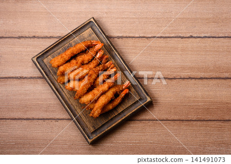 Shrimp or prawn tempura breaded with salt, spices and tartar sauce, Asian cuisine. Tempura shrimp Shrimp or prawn tempura breaded with salt, spices and tartar sauce, Asian cuisine. Tempura shrimp 141491073