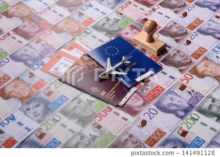 Sweden, swedish passport or id document with tickets for flight, travel. Swedish passport Sweden, swedish passport or id document with tickets for flight, travel. Swedish passport 141491128