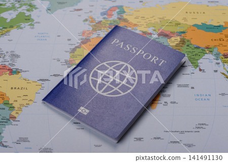 International passport against a map backdrop, concepts of travel. Passport on a map International passport against a map backdrop, concepts of travel. Passport on a map 141491130