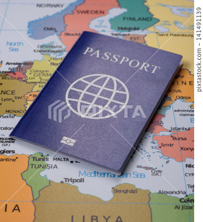 International passport against a map backdrop, concepts of travel. Passport on a map International passport against a map backdrop, concepts of travel. Passport on a map 141491139