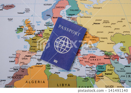 International passport against a map backdrop, concepts of travel. Passport on a map International passport against a map backdrop, concepts of travel. Passport on a map 141491140