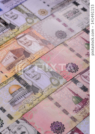 Saudi Arabia paper money, riyal banknotes and coins as currency for exchange. Saudi Arabia money 141491153