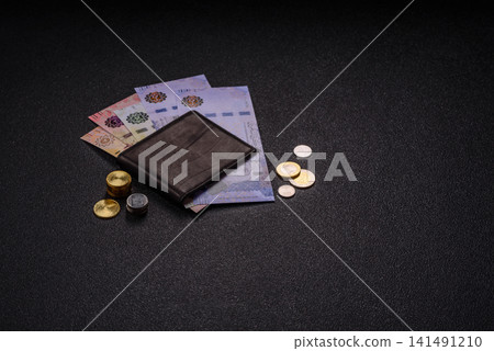 Saudi Arabia paper money, riyal banknotes and coins as currency for exchange. Saudi Arabia money 141491210