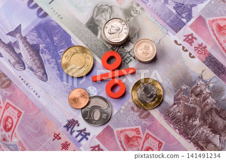 Taiwan, Taiwanese paper banknotes and coins, dollars of various denominations. Taiwanese dollars Taiwan, Taiwanese paper banknotes and coins, dollars of various denominations. Taiwanese dollars 141491234