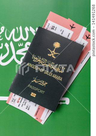 Saudi Arabia passport or id document with tickets for flight, travel. Saudi Arabia passport Saudi Arabia passport or id document with tickets for flight, travel. Saudi Arabia passport 141491268