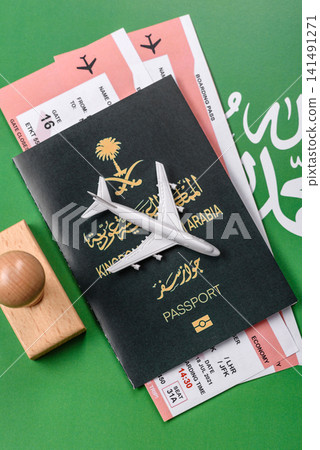 Saudi Arabia passport or id document with tickets for flight, travel. Saudi Arabia passport Saudi Arabia passport or id document with tickets for flight, travel. Saudi Arabia passport 141491271