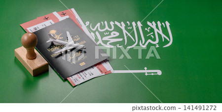 Saudi Arabia passport or id document with tickets for flight, travel. Saudi Arabia passport Saudi Arabia passport or id document with tickets for flight, travel. Saudi Arabia passport 141491272