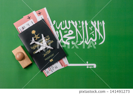 Saudi Arabia passport or id document with tickets for flight, travel. Saudi Arabia passport Saudi Arabia passport or id document with tickets for flight, travel. Saudi Arabia passport 141491273