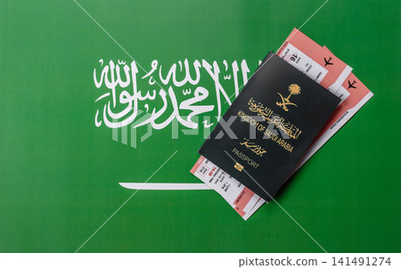 Saudi Arabia passport or id document with tickets for flight, travel. Saudi Arabia passport Saudi Arabia passport or id document with tickets for flight, travel. Saudi Arabia passport 141491274
