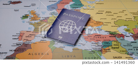 International passport against a map backdrop, concepts of travel. Passport on a map International passport against a map backdrop, concepts of travel. Passport on a map 141491360