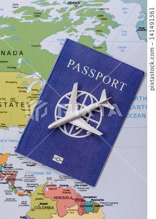International passport against a map backdrop, concepts of travel. Passport on a map International passport against a map backdrop, concepts of travel. Passport on a map 141491361