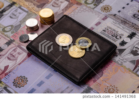Saudi Arabia paper money, riyal banknotes and coins as currency for exchange. Saudi Arabia money 141491368