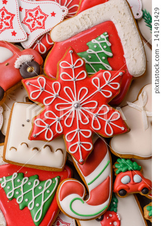 Gingerbread as a Christmas staple, sweet biscuits for the holiday table. Gingerbread as a backdrop Gingerbread as a Christmas staple, sweet biscuits for the holiday table. Gingerbread as a backdrop 141491429