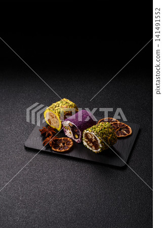 Turkish delight or lokum is a traditional Eastern sweet made with nuts. Turkish delight, lokum Turkish delight or lokum is a traditional Eastern sweet made with nuts. Turkish delight, lokum 141491552