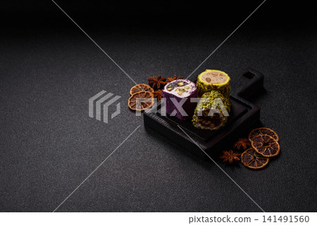 Turkish delight or lokum is a traditional Eastern sweet made with nuts. Turkish delight, lokum Turkish delight or lokum is a traditional Eastern sweet made with nuts. Turkish delight, lokum 141491560