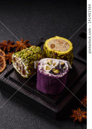 Turkish delight or lokum is a traditional Eastern sweet made with nuts. Turkish delight, lokum Turkish delight or lokum is a traditional Eastern sweet made with nuts. Turkish delight, lokum 141491564